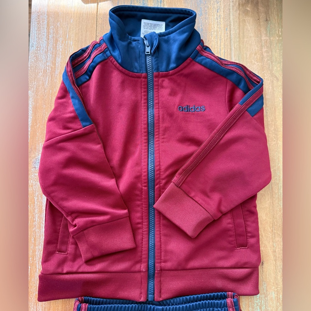 Adidas Tracksuit Two-Piece Set Includes a Full-Zip Jacket and matching Pants